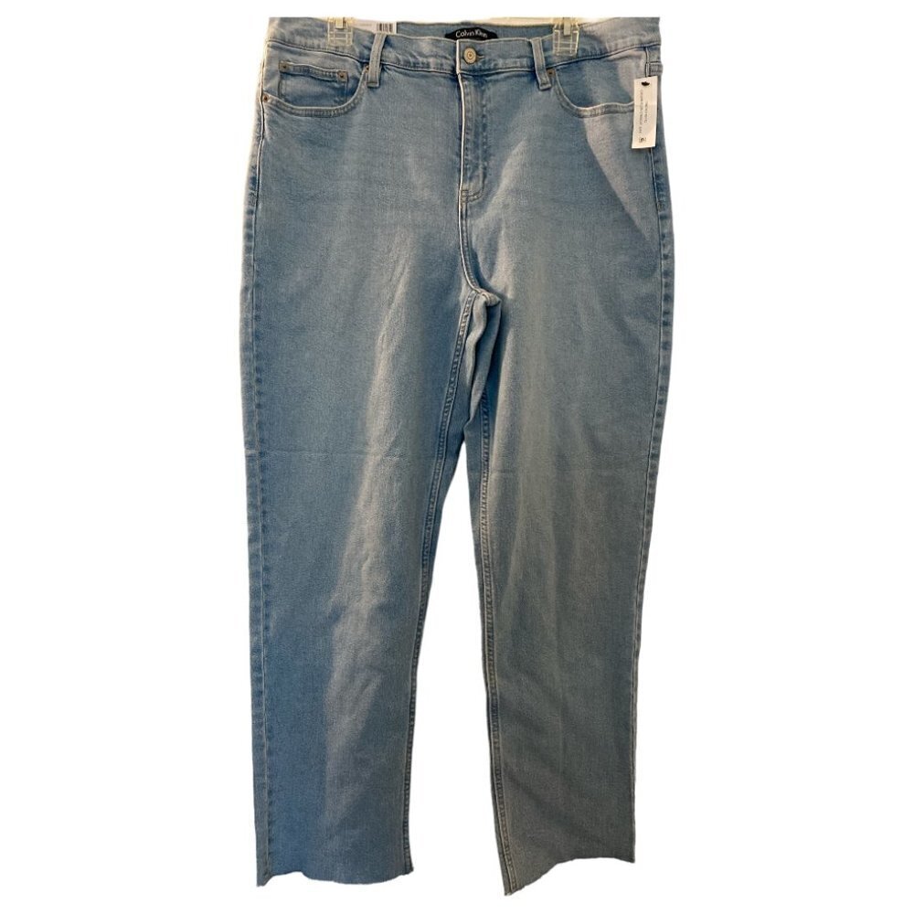 Calvin Klein jeans, size 16, Vintage Straight style, light blue wash.  Raw hem.